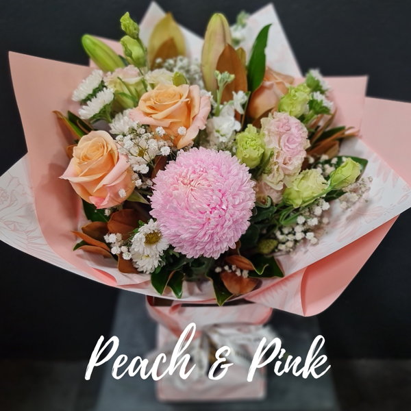 Peach & Pink Wrapped Seasonal Arrangement